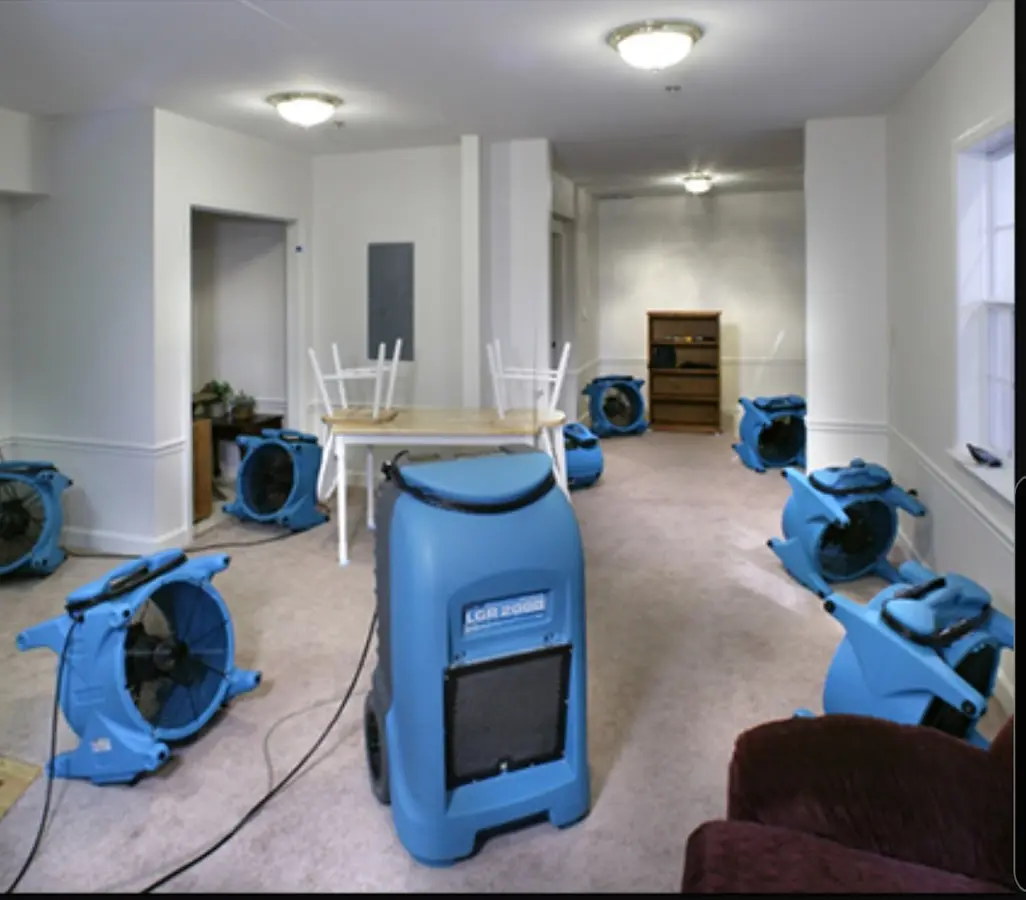 Air movers and dehumidifier setup for Water Extraction & Removal in North Logan